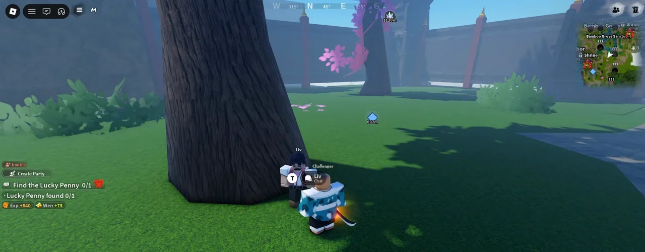 A player next to Liv at the foot of the big tree